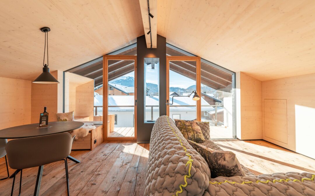 Alpstyle Ferienwohnungen - Wohnbereich mit Bergblicka